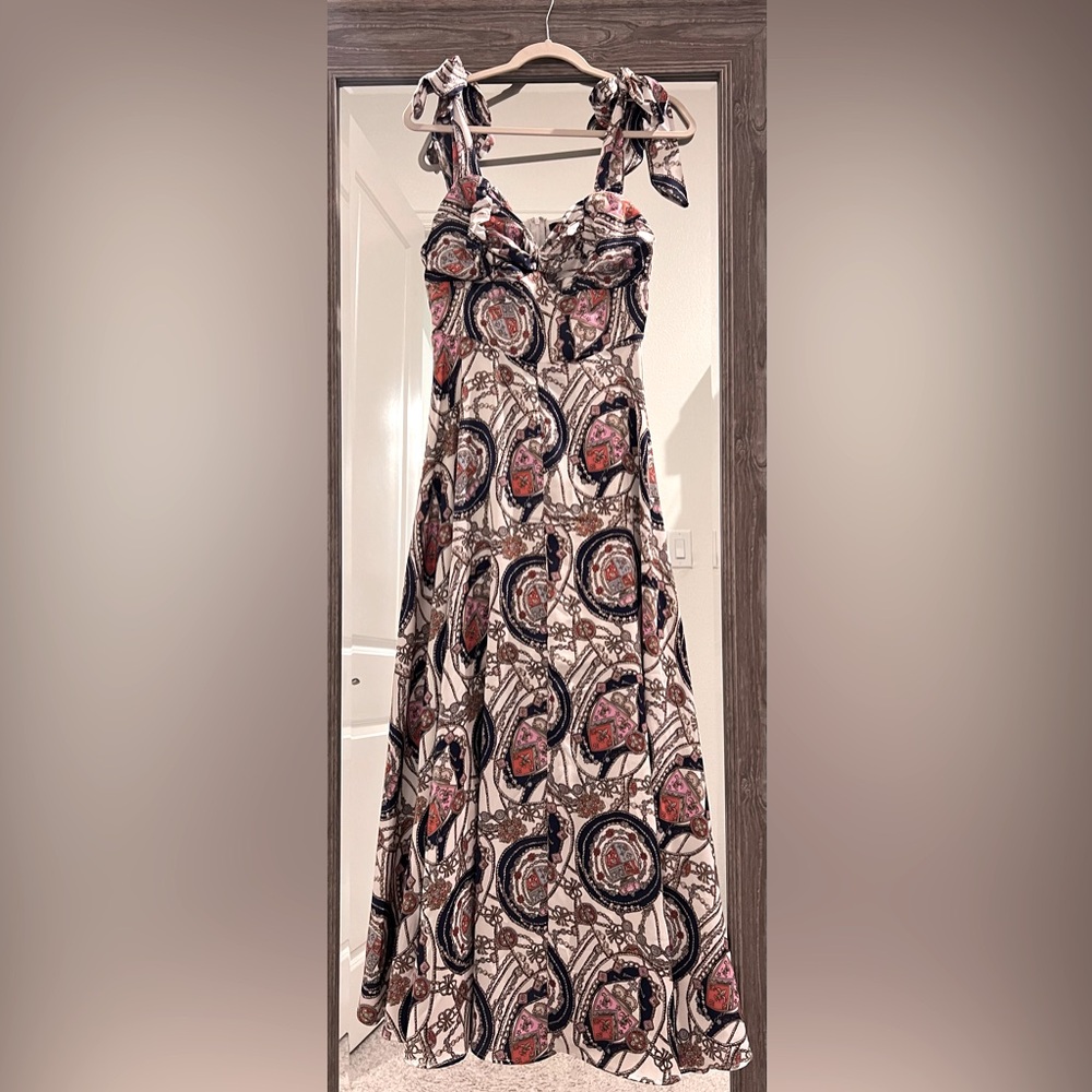 Multi colored maxi dress. Made by Banjul. Size small with self tie straps.